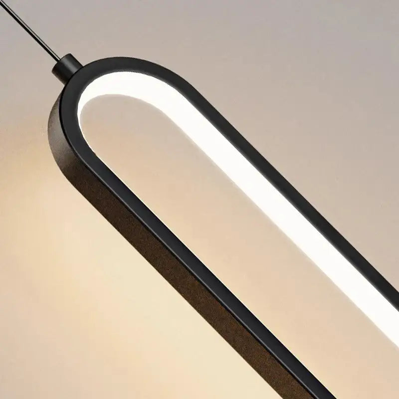 Modern black decorbites led staircase pendant lights with sleek curved design and integrated warm white led strip illumination