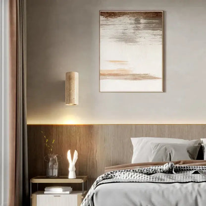 Modern abstract painting with beige taupe and white horizontal brushstrokes framed by wood in decorbites led stone wall sconce