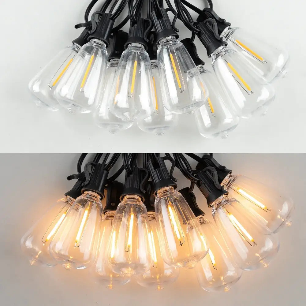 Clear glass decorbites led string light bulb e12 1w shatterproof plastic with visible filaments unlit and glowing warmly