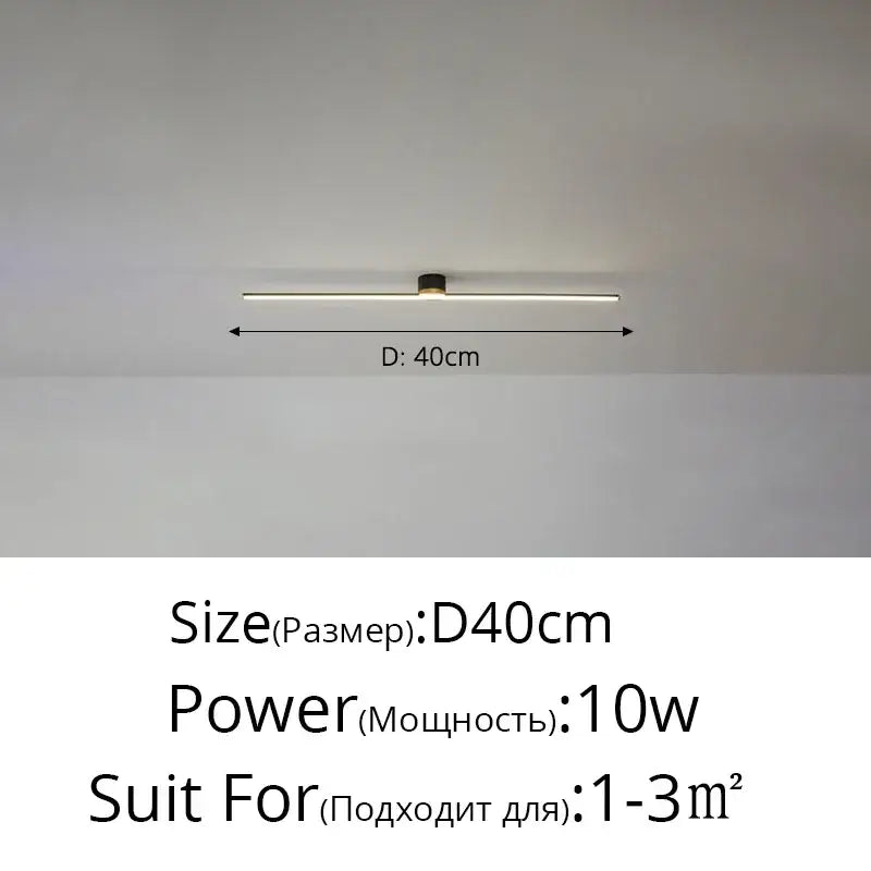A sleek decorbites led strip ceiling light with a slim black fixture and warm white illumination for indoor use