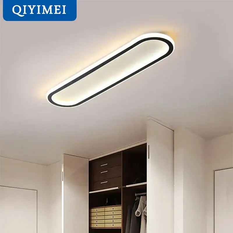Modern oval-shaped ceiling lights with sleek black frame and soft white illumination by qiyimei for decorbites led strip ceiling