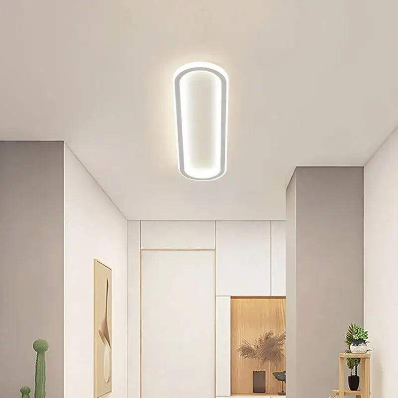 Modern rectangular decorbites led strip ceiling light with sleek white frame and soft glowing illumination for indoor use
