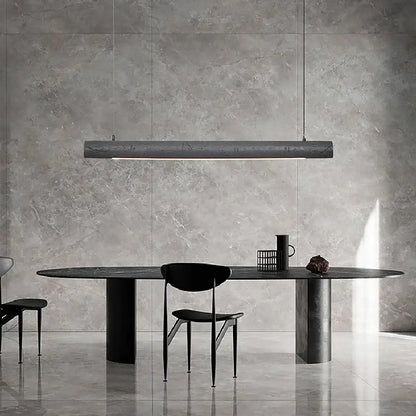 Modern minimalist pendant light with cylindrical design and matte gray finish from decorbites led strip chandelier collection