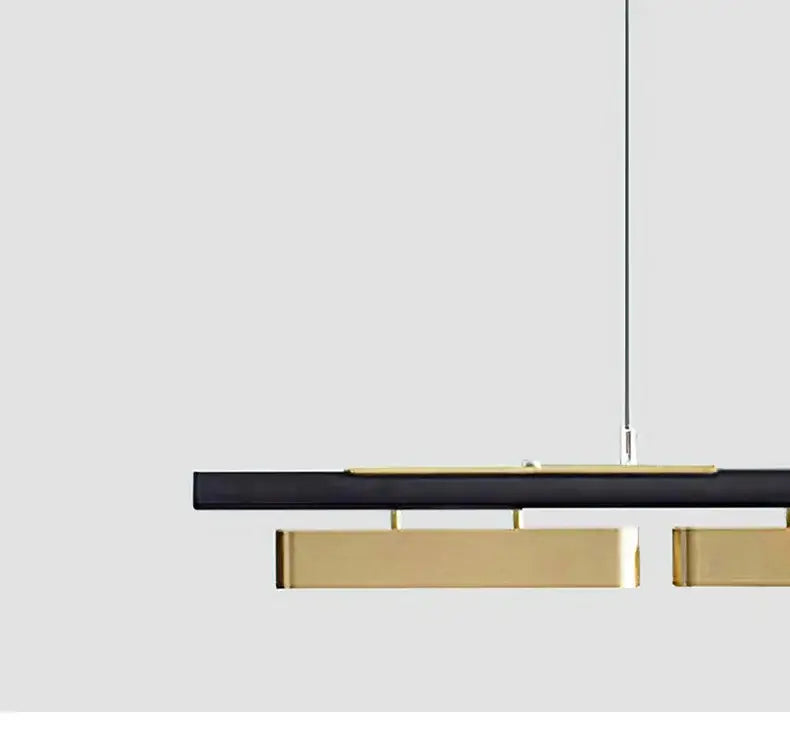 Modern black and brass DecorBites™ pendant lights with sleek minimalist strip led design for home dining use