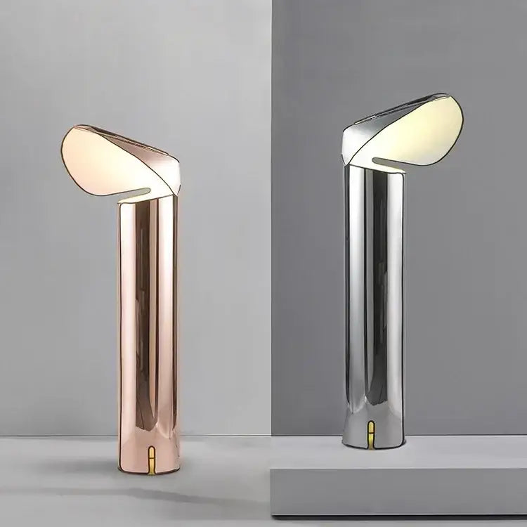 Modern decorbites led table lamp with sleek metallic base and curved rose gold shade for bedroom and study lighting