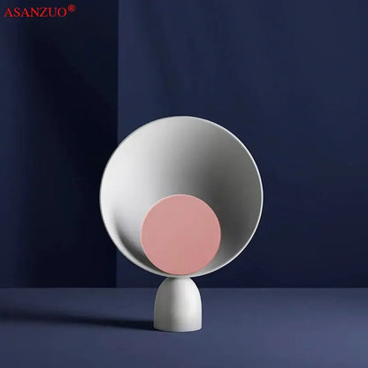 Minimalist white ceramic decorbites led table lamp with soft pink accent for modern living room and study desk lighting