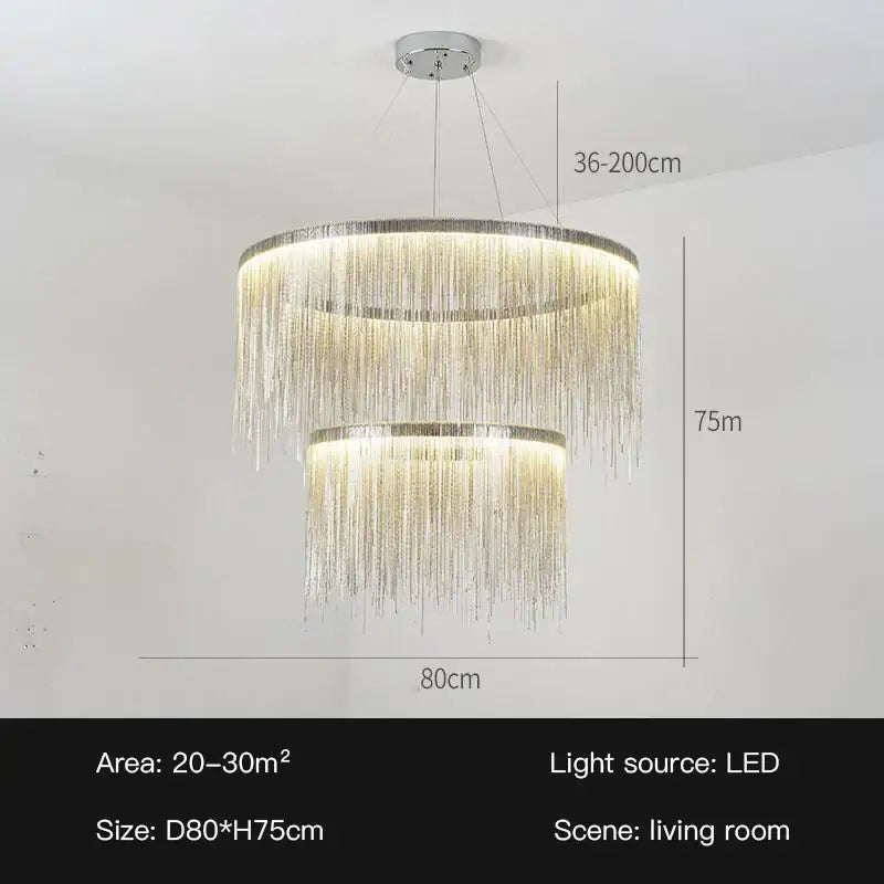 A modern two-tiered decorbites led tassel chandelier pendant light with golden led strands and chrome ceiling mount