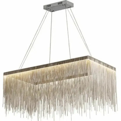 A modern decorbites led tassel chandelier with sleek chrome finish and cascading clear faceted glass strands