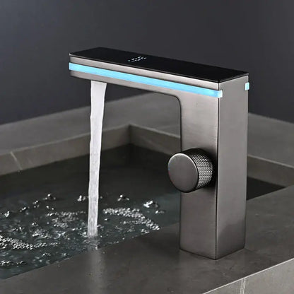 Modern matte black and brushed steel basin faucet with decorbites led temperature display and blue led strip lighting