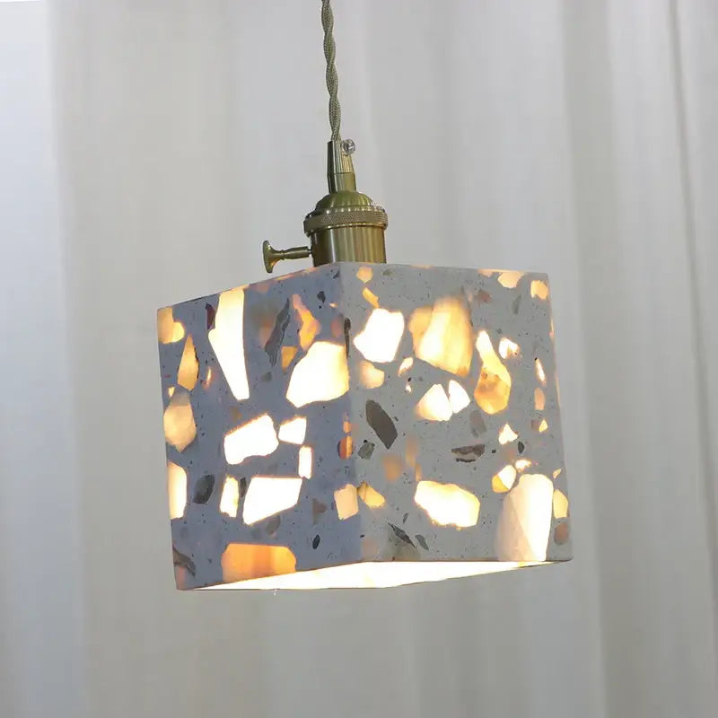 Decorbites led terrazzo square pendant light with gray concrete body and golden stone fragments in antique brass fixture