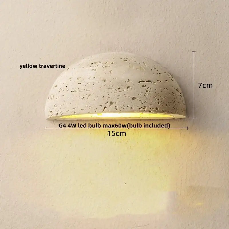 A decorbites led travertine half-moon wall light in natural yellow stone with warm led light for study or porch ambiance