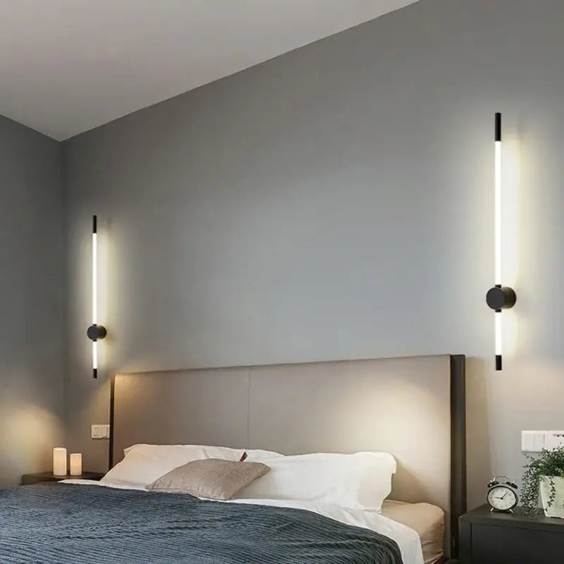 Modern black and white decorbites led tube wall lights with sleek cylindrical design for bedroom and living room use