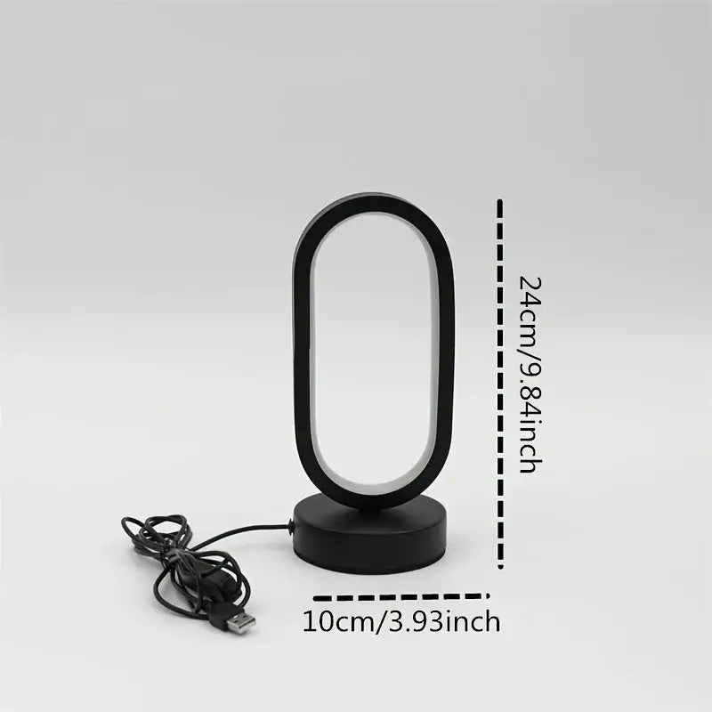 Black oval-shaped DecorBites led bedside decorative lamp with usb charging cable for bedroom bedside lighting