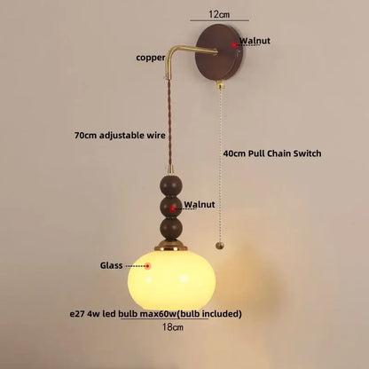 Warm-toned decorbites led wall orange glass pendant light with copper finish and walnut beads for bedroom brass accent