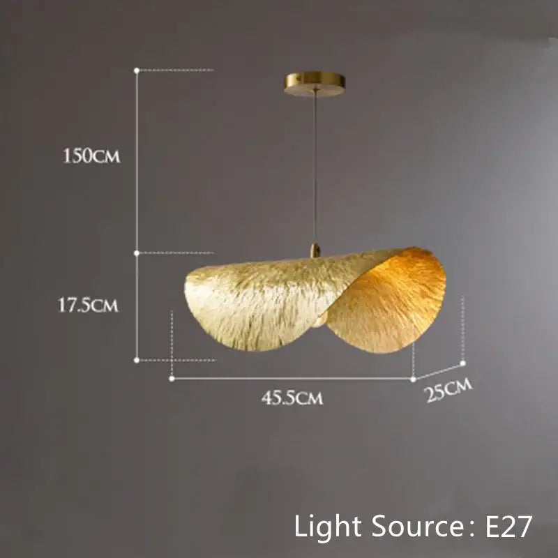 Gold-toned leaf-shaped pendant light with textured surface and curved design by DecorBites lotus flower for elegant spaces