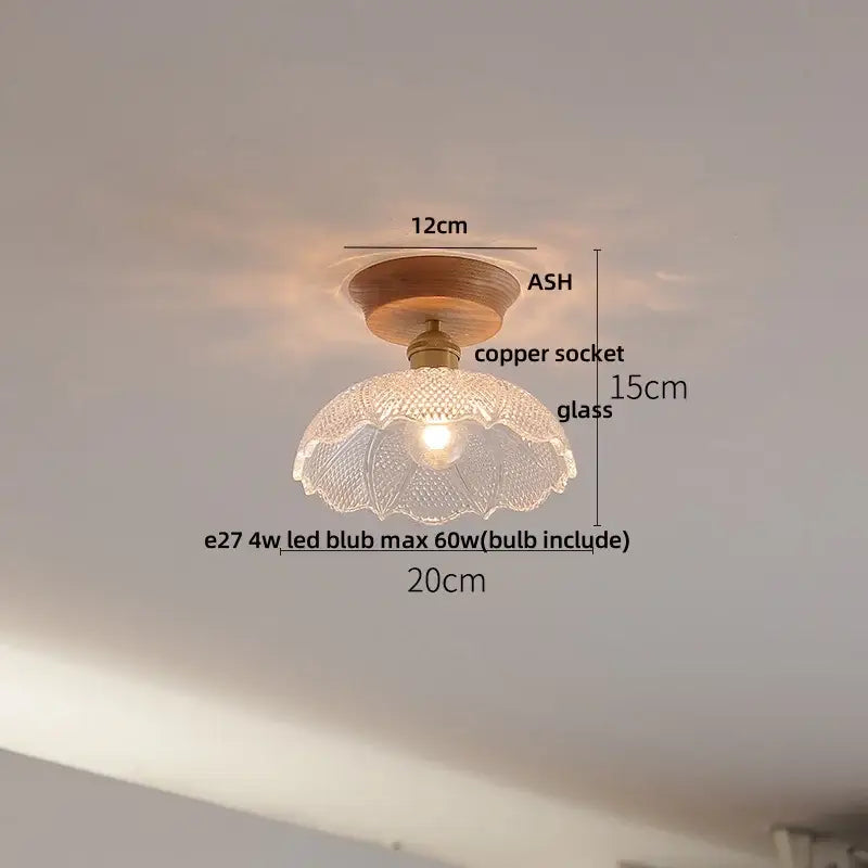 Decorbites lotus glass led ceiling light with translucent scalloped glass shade and copper base on ash wood
