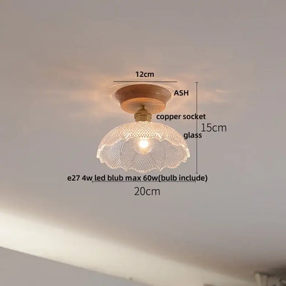 Decorbites lotus glass led ceiling light with translucent scalloped glass shade and copper base on ash wood