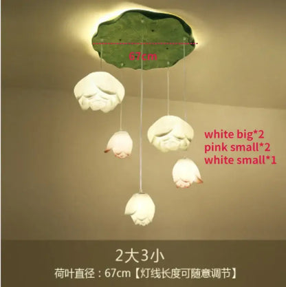 A decorbites lotus glass pendant lamp with a green lotus leaf ceiling fixture and five matte glass flower lamps in white and pink