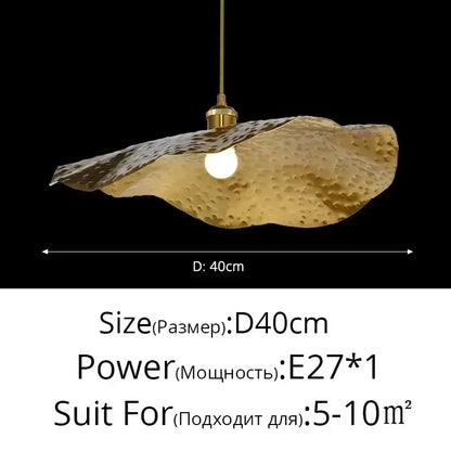 A golden lotus leaf brass pendant lamp by decorbites featuring a hammered texture and e27 bulb for minimalist spaces