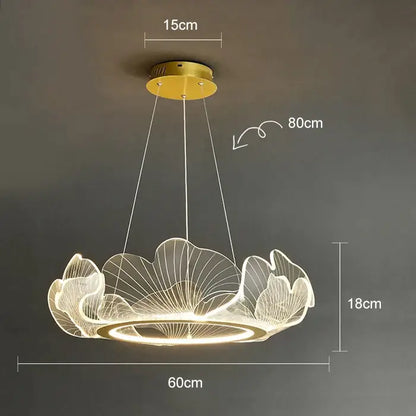 A modern gold-finished decorbites lotus leaf chandelier with translucent leaves and illuminated circular base for living spaces