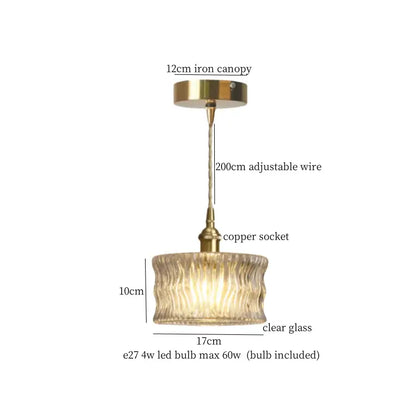 A brass-finished decorbites lotus leaf glass pendant light with clear ribbed shade and adjustable wire suspension