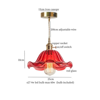 A vibrant red decorbites lotus leaf glass pendant light with fluted design and brass hardware for loft living spaces