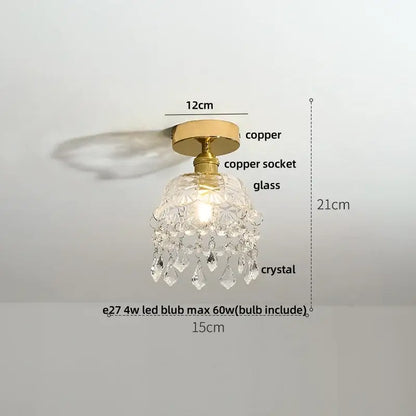 A delicate decorbites lotus leaf ceiling lamp with a brass copper base and clear crystal glass housing