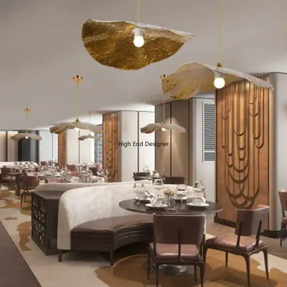 Gold-colored decorbites lotus leaf led pendant lights with textured leaf-shaped shades for modern home interior décor