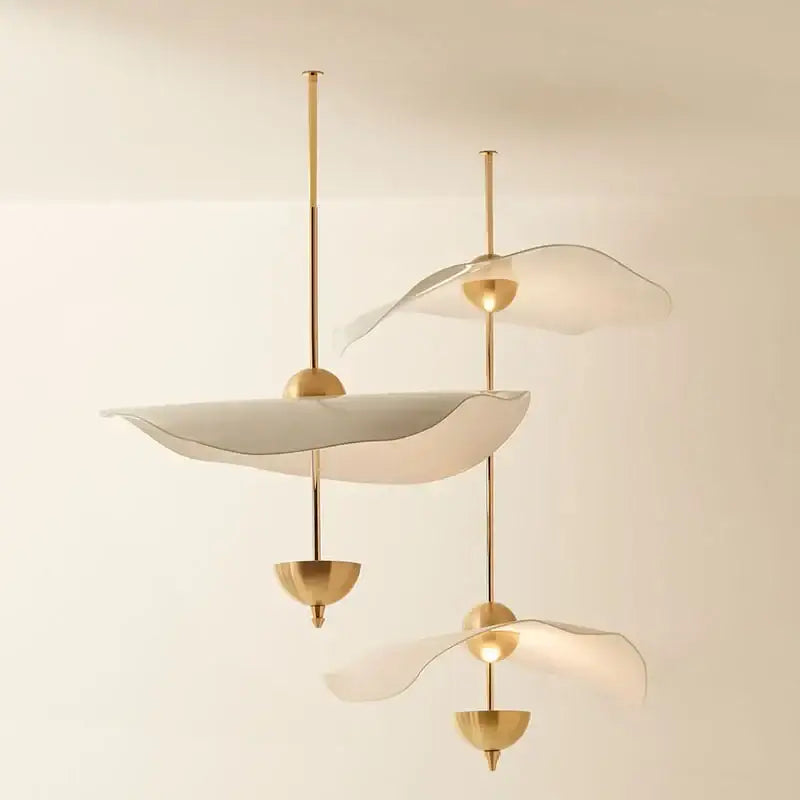 Elegant gold-toned decorbites lotus leaf pendant lamp with translucent sculptural petal shades for luxury living room decor