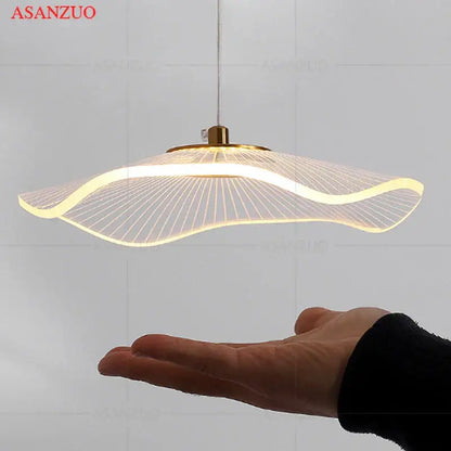 Modern gold-toned decorbites lotus leaf single pendant lamp with a sleek wave-shaped design and illuminated led strip