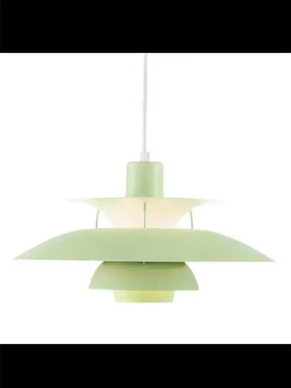 A mint green layered pendant light with sleek modern design in the decorbites loui led pendant for kitchen or living room