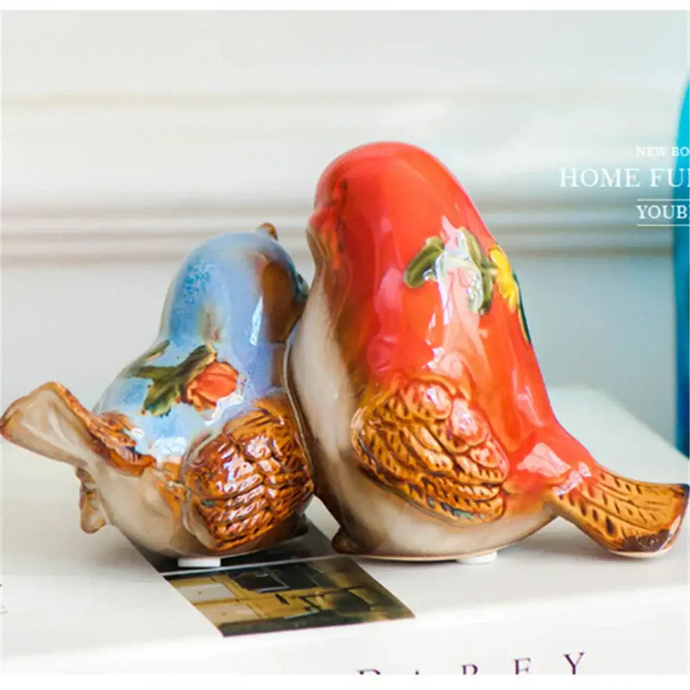 Decorbites love birds porcelain couple ornament featuring red and blue ceramic love birds with detailed designs