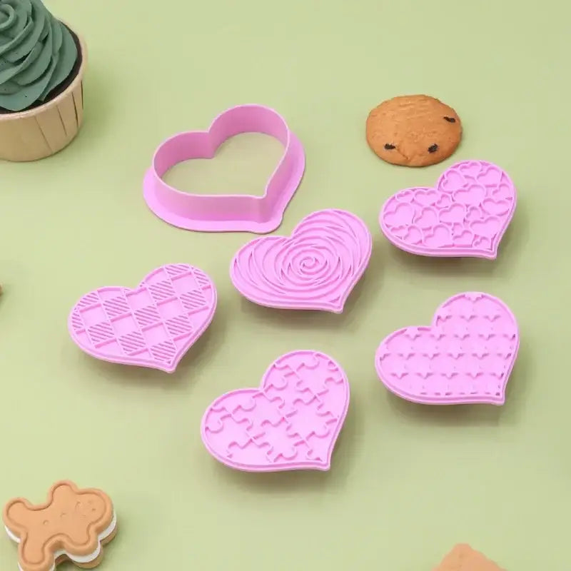 Set of pink decorbites love heart biscuit cutters with intricate designs for valentine’s day cake decorating tools