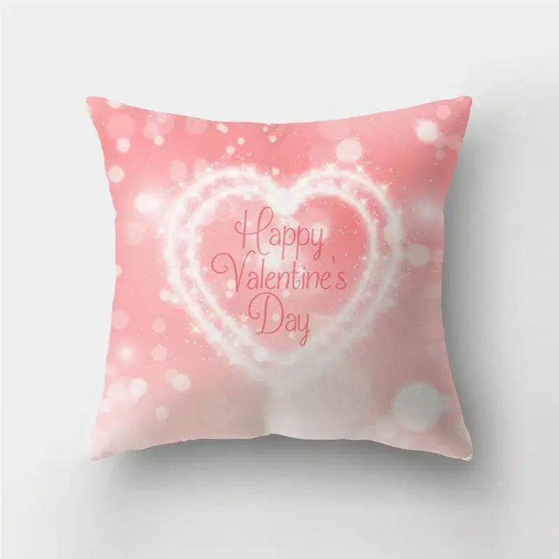 Pink fabric cushion cover with white love heart print and happy valentines day cursive for sofa decor