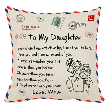 Cream-colored decorbites love mom cushion cover with vintage airmail design and mother embracing child illustration