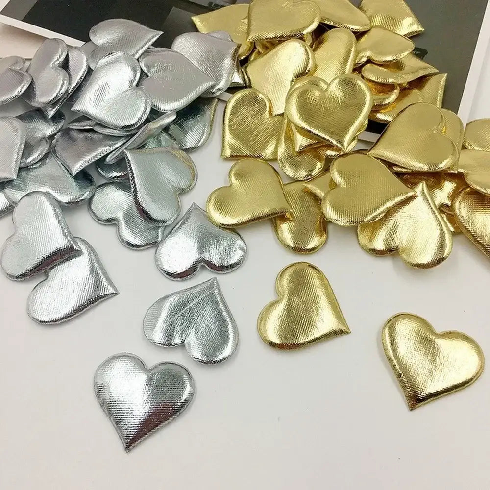 Shiny metallic silver and gold heart-shaped embellishments with textured fabric on decorbites love petal peach heart bouquet