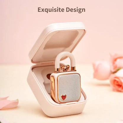 Rose gold lovelock mini bluetooth heart-shaped speaker with white handle and matching case for portable use