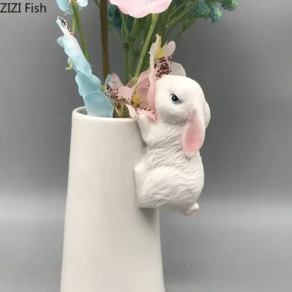 White ceramic vase with a cute sculpted bunny figurine side detail by DecorBites lovely rabbit ceramic for decor
