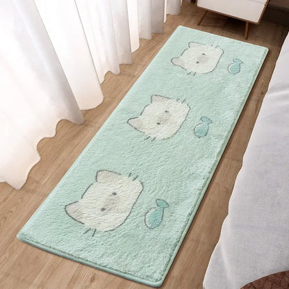 Mint green plush bath mat with three white hello kitty faces and teal fish complements decorbites lovely rabbit pink bedside rug