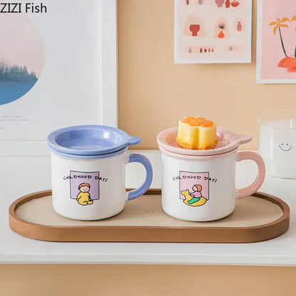Two pastel-colored porcelain coffee mugs with matching lids featuring decorbites lovers cartoon pattern and handles in blue and pink