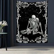 Black and white decorbites lovers skull tapestry featuring a romantic skeleton couple with rose vine border for wall decor