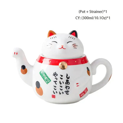 White ceramic decorbites lucky cat porcelain teapot shaped like a smiling maneki-neko with orange and black accents