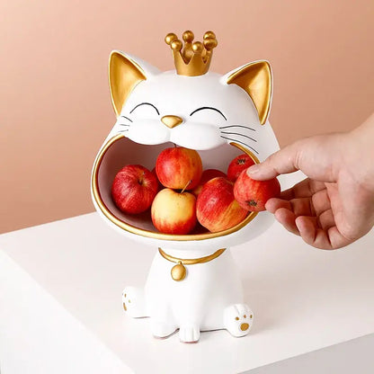 White ceramic decorbites lucky cat sculpture fruit bowl with gold crown holding red apples for modern table decor