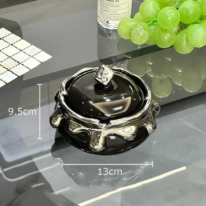 Black and silver decorbites lucky ceramic ashtray with glossy finish and ornate dripping design for premium smoking accessories