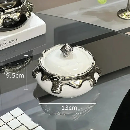 White ceramic ashtray with silver rim and lid featuring ornate dripping design and diamond handle decorbites lucky ceramic ashtray