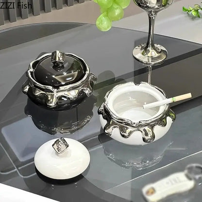 Black and white ceramic ashtrays with silver metallic drip detailing from decorbites lucky ceramic ashtray collection