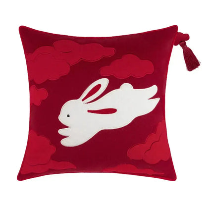A plush red velvet decorbites lucky rabbit pillowcase with white embroidered rabbit and pine forests motif tassel