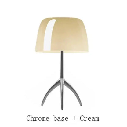 Cream-colored glossy lampshade on chrome tripod base decorbites lumiere glass table lamp for bedroom and living room use