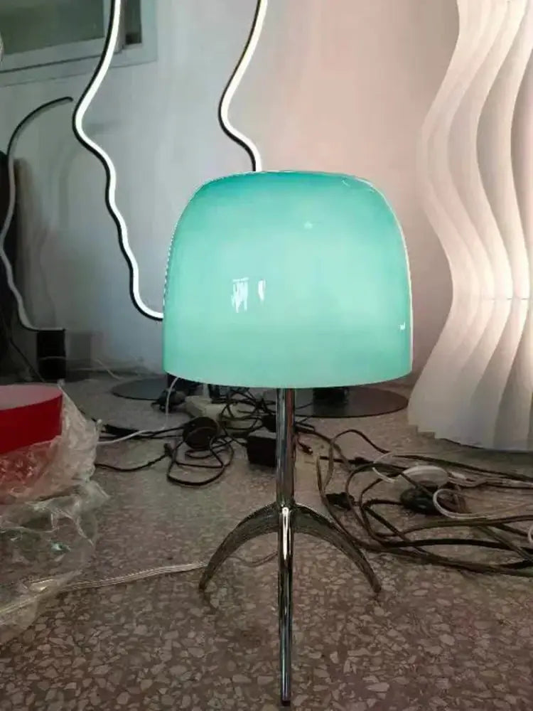 DecorBites Lumiere table lamp with sleek mint green glass shade and polished chrome tripod base for modern bedroom use