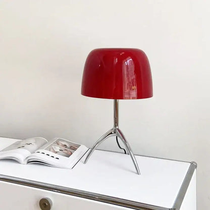 Vibrant red glossy glass decorbites lumiere table lamp with sleek chrome tripod base for bedroom and living room